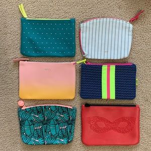 6 IPSY makeup bags.